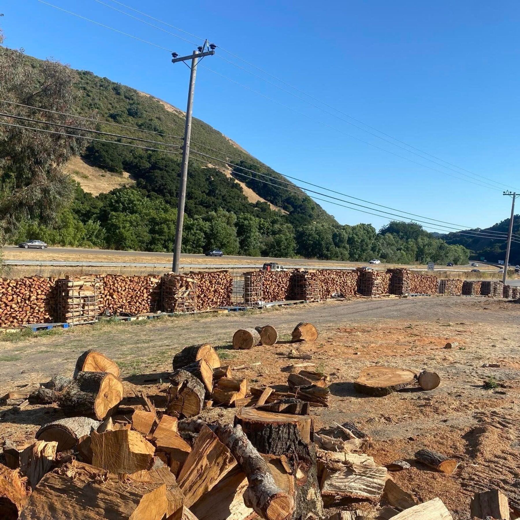Rows of stacked oak in baskets along the 805 Red Oak yard, right off Highway 101 on Ontario Road